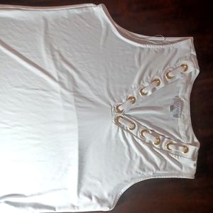 A white and gold Carmen shirt